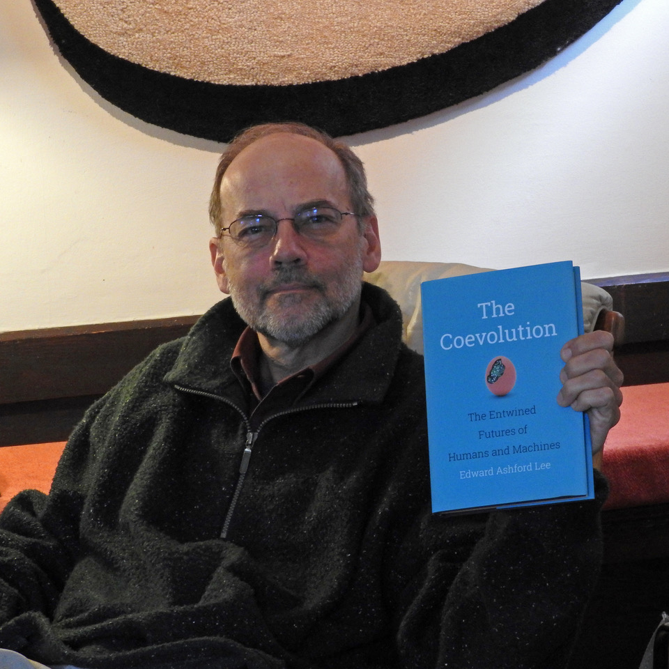 Edward Ashford Lee with his new book: The Coevolution (Photo by E. A. Lee) Edward Ashford Lee with his new book: The Coevolution (Photo by E. A. Lee)